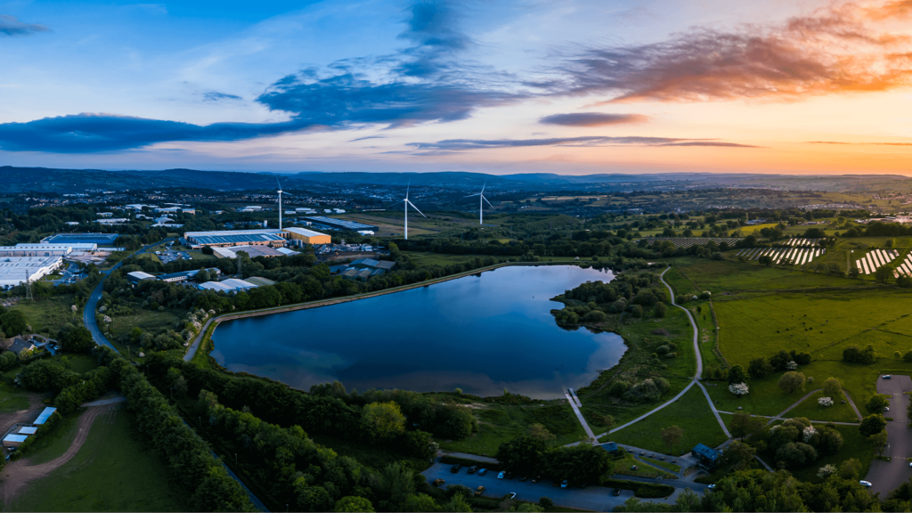 Beautiful sunset at Pen-y-fan pond with with turbines in background