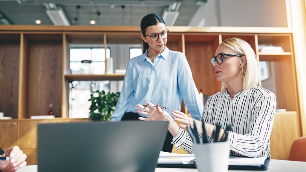 Women in office talking in meeting