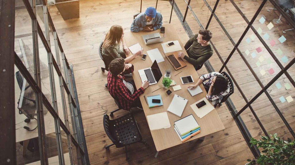 Group of people working at desk